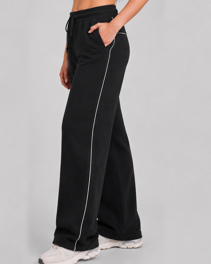 Jogger Motion Mujer negro, vista lateral - Kipure